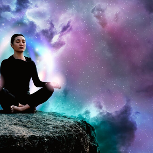 Serene individual meditating with a calming aura, highlighting spiritual growth and inner peace through aura analysis.